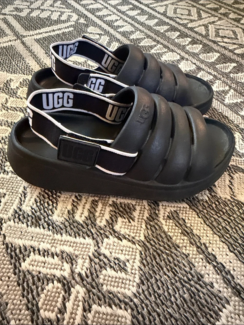 UGG Kids Black Puffy Slide Sandals with Logo Heel Strap